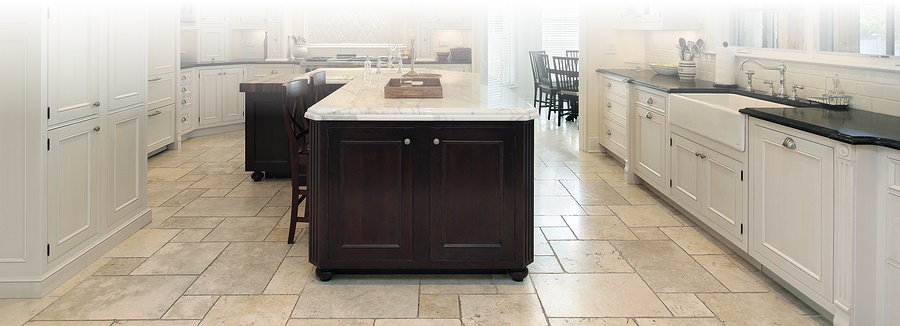 cleaned tile kitchen floor with white cabinets